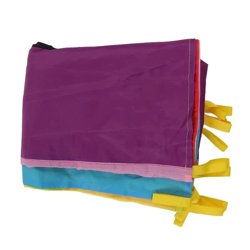 Vibrant rainbow-coloured parachute game for group play, promoting teamwork and skill development