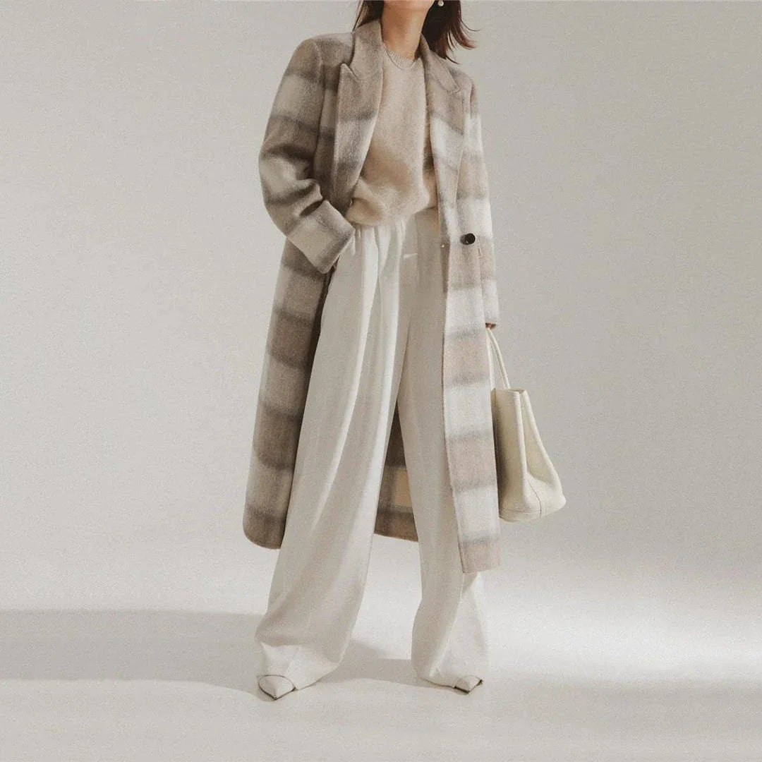 Elegant plaid double-breasted long woollen coat for women, featuring a premium blend of wool, cotton and polyester for exceptional quality and warmth.