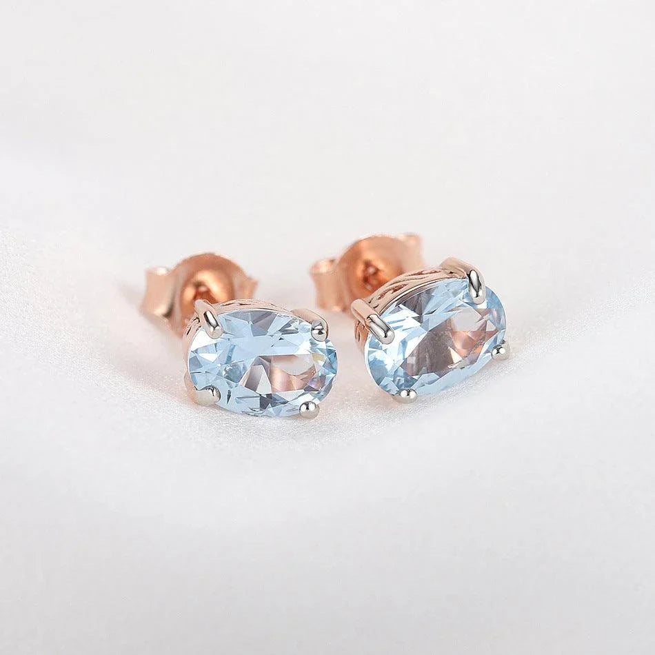 Pair of rose gold-plated sterling silver earrings with a minimalist, geometric design