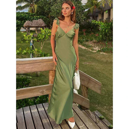 Elegant sleeveless ruffle maxi dress in green with backless design, made of premium silk and polyester blend