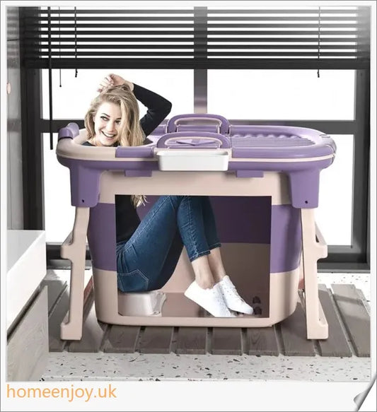 A folding full-body soaking tub made of high-quality plastic, available in green or purple with or without a cover