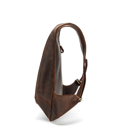 Elegant leather shoulder bag in a classic British design, featuring adjustable straps and a timeless colour palette.