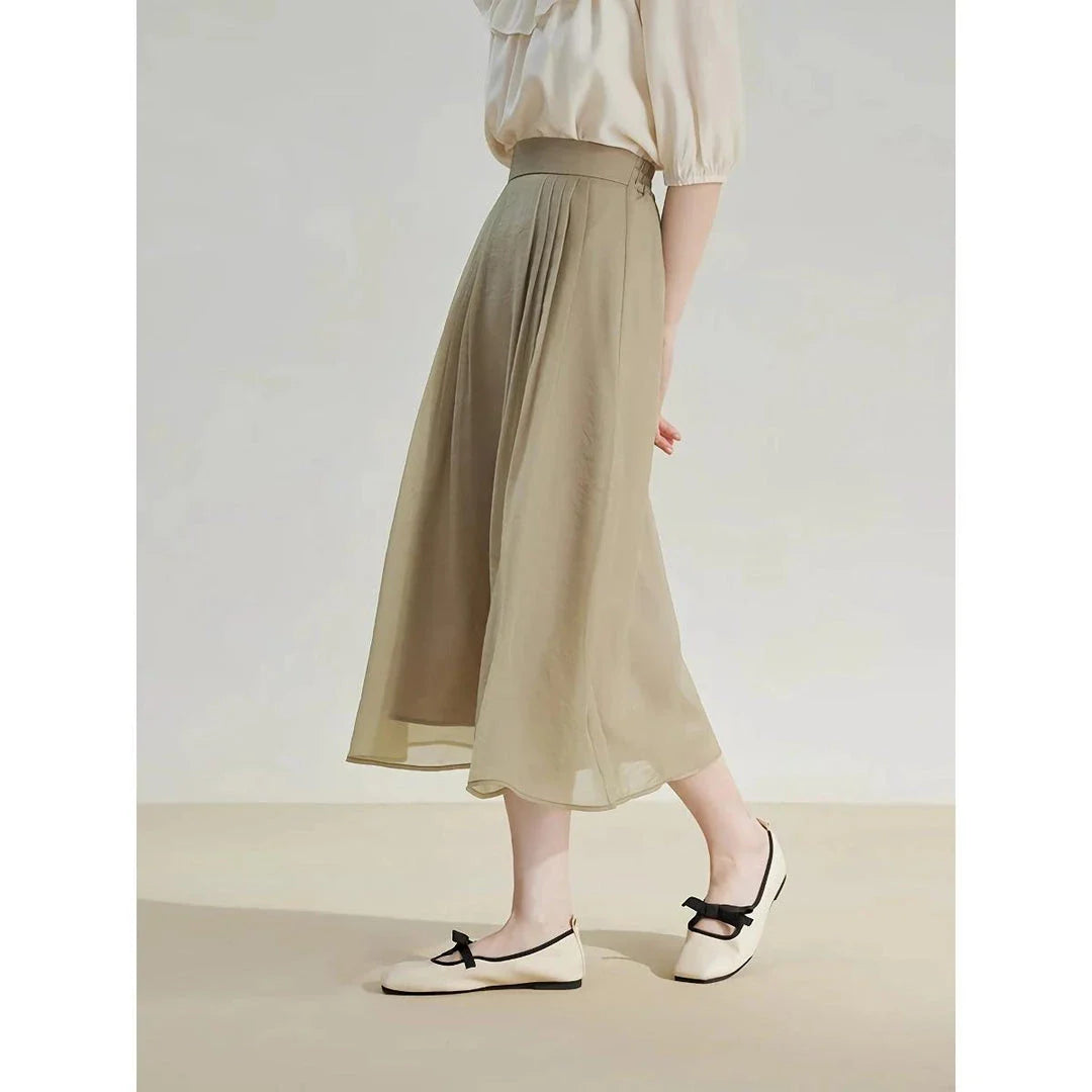 Elegant high-waist a-line midi skirt in a solid, vibrant colour for professional and social wear