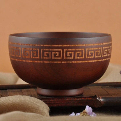 Elegant Mongolian-style wooden serving bowl with a smooth, natural grain and subtly curved silhouette