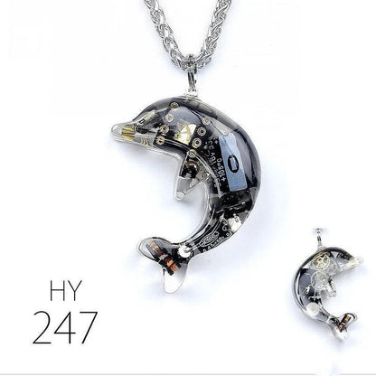 Steampunk-inspired dolphin pendant necklace with electronic components and brass accents