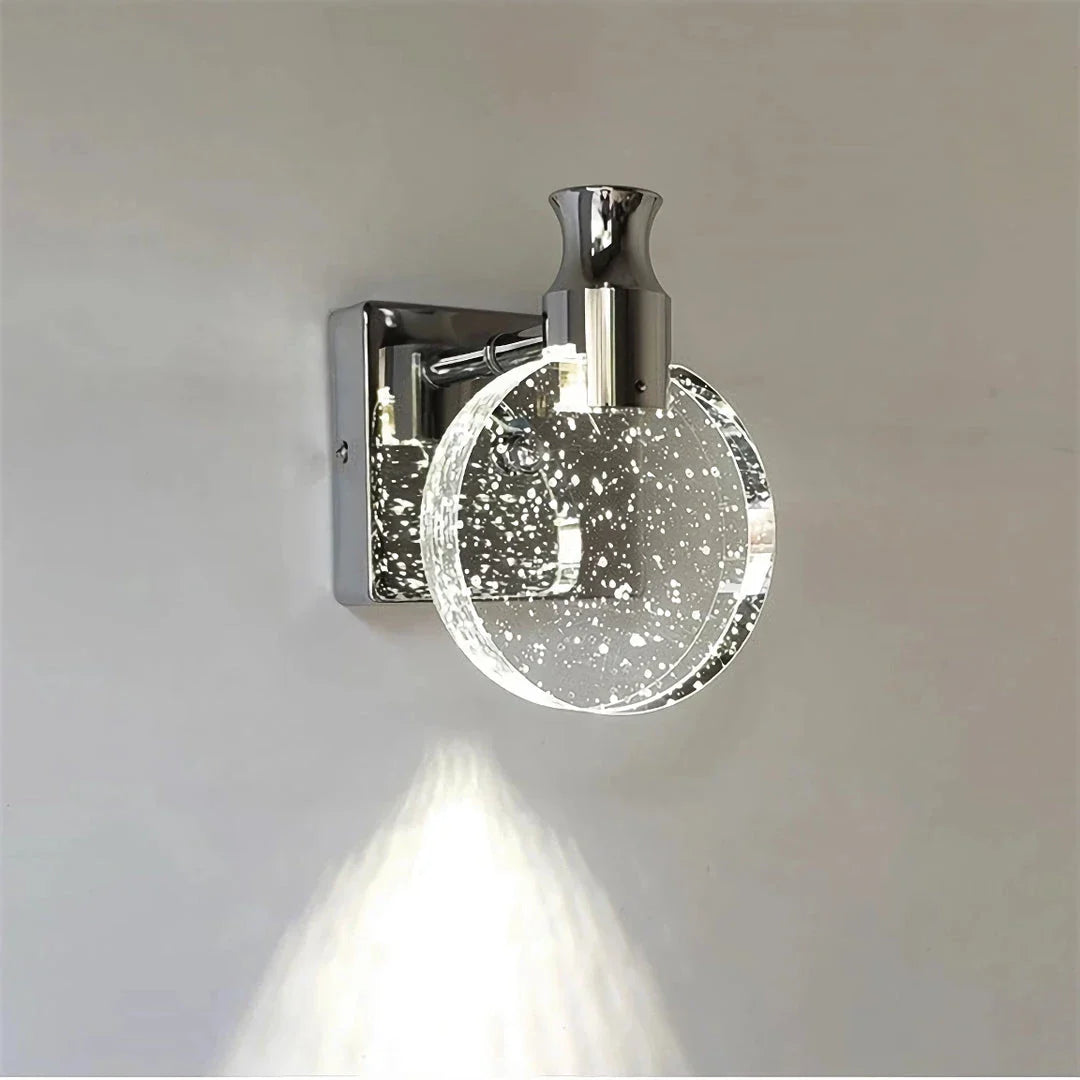 Elegant crystal LED wall lamp with copper body and glass shade, offering warm, cool, and neutral lighting modes for versatile home decor