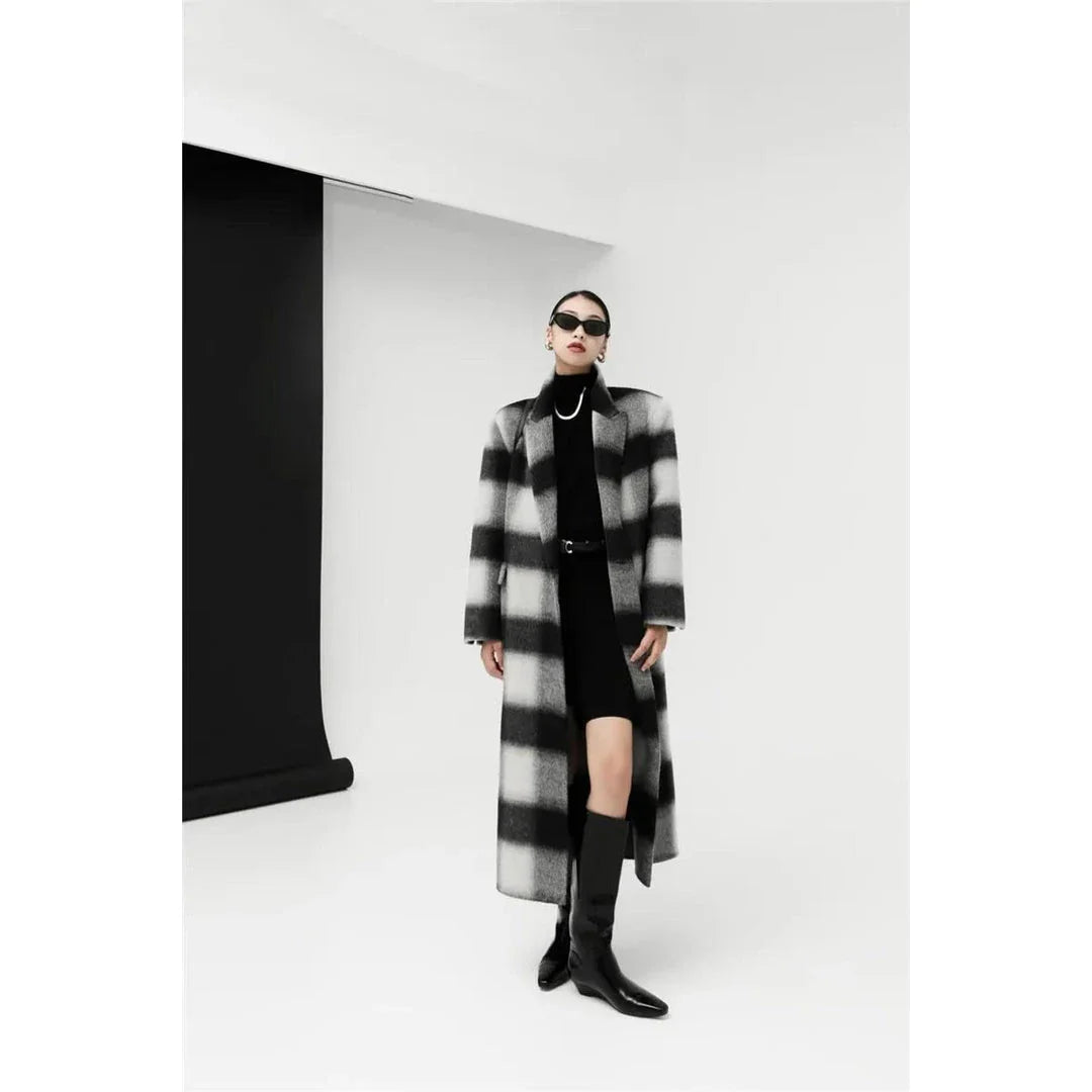 Elegant plaid double-breasted long woollen coat for women, featuring a premium blend of wool, cotton and polyester for exceptional quality and warmth.