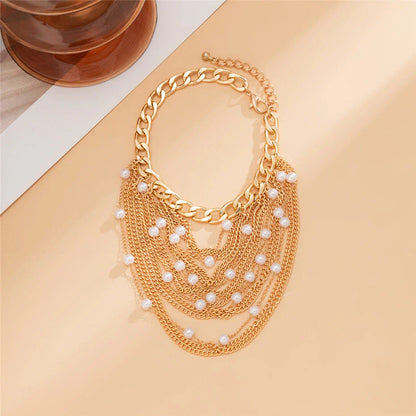 Elegant gold boho chic tassel and pearl anklet for women