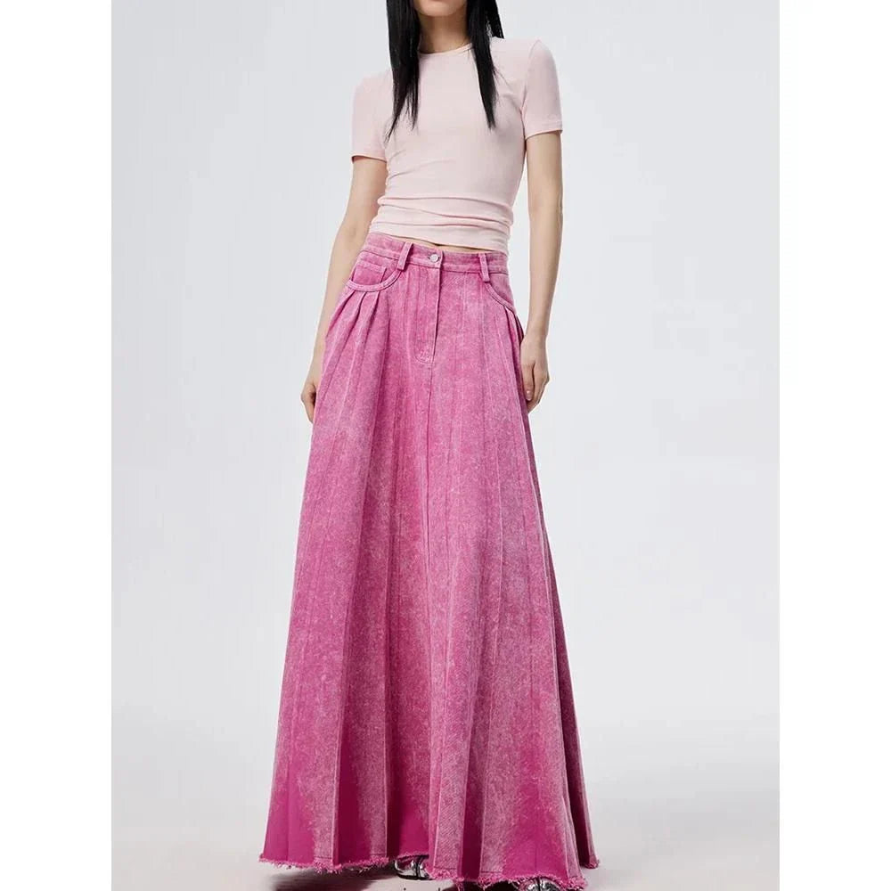 Elegant high-waist A-line denim skirt in a vibrant rose pink colour, perfect for any occasion.