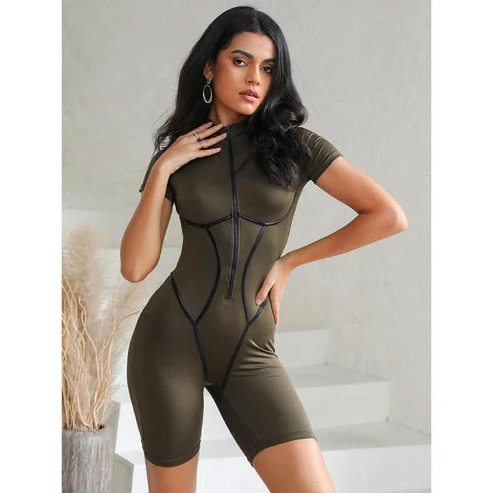 A high-quality polyester jumpsuit with a striped pattern and a zipper detail, perfect for autumn fashion.