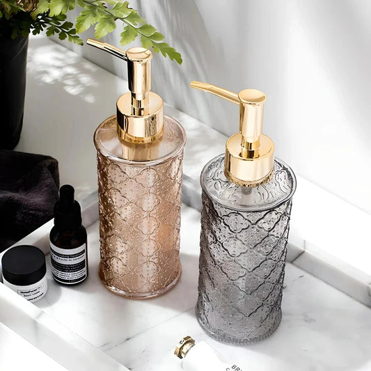 Elegant glass soap dispenser with sleek, minimalist design for bathroom and kitchen use
