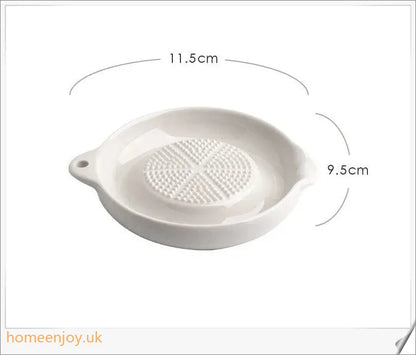 Ceramic ginger grater with no sharp blades, ideal for a family-friendly kitchen
