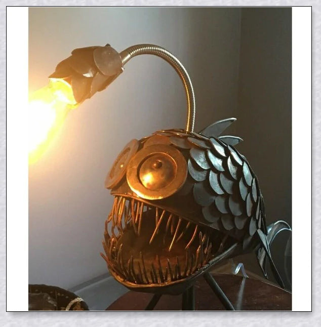 Handcrafted Steampunk Angler Fish Lamp with a warm, soothing glow for desk or office decor