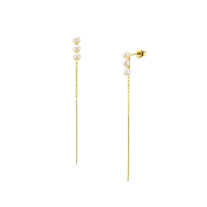 Elegant natural pearl earrings in a sleek silver frame, a timeless accessory for any occasion