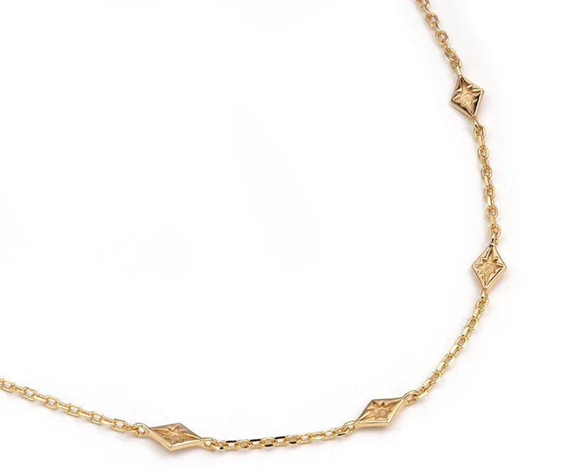 A simple yet elegant sterling silver necklace with a geometric design, a premium accessory handcrafted in Britain.