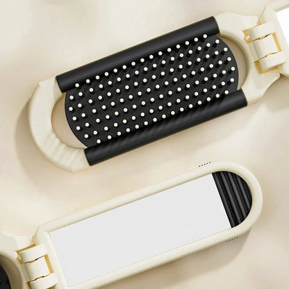 Compact, folding hairbrush with mirror and massage comb - a versatile grooming accessory for modern women