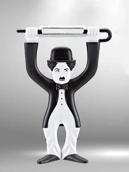 Vintage-inspired plastic fruit and vegetable peelers featuring the iconic silhouette of Charlie Chaplin's Tramp character