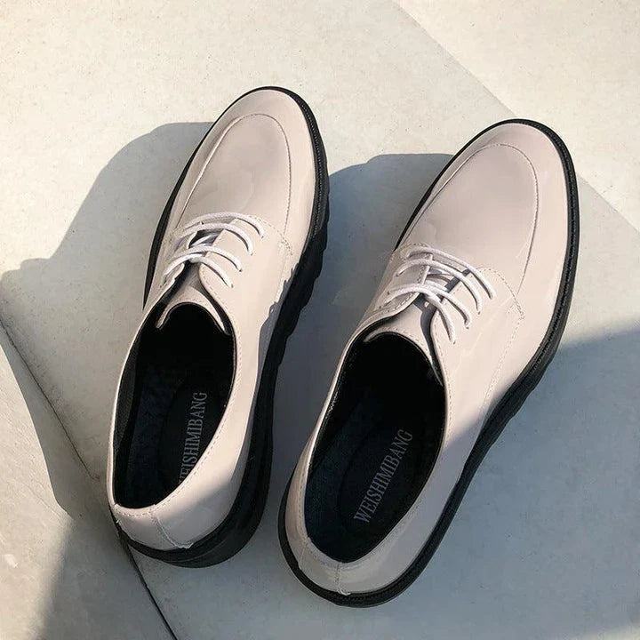 Premium microfiber leather casual shoes with thick rubber sole, low-top design, and striking Korean-inspired details