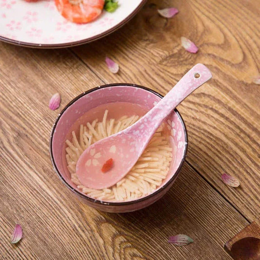 Elegant beige and pink ceramic rice bowl with a smooth, glazed finish and a generous 11.2 cm diameter