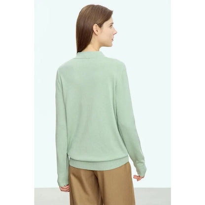 Chic minimalist u-collar long sleeve pullover in green and purple colours, featuring elegant design and cozy materials