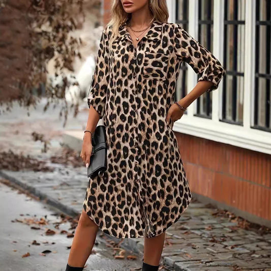Elegant leopard print beach cover-up dress with A-line silhouette, loose waist, and pockets for comfortable and stylish holiday wear