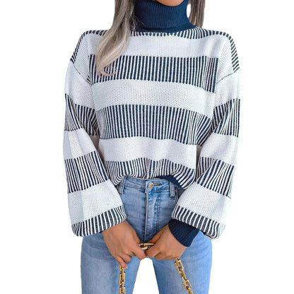 Cosy and stylish high-neck striped sweater in various colours, featuring lantern sleeves and a relaxed fit for all-day comfort.