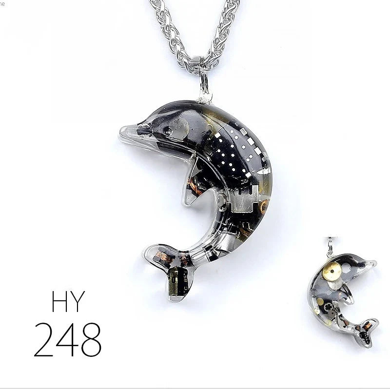 Steampunk-inspired dolphin pendant necklace with electronic components and brass accents