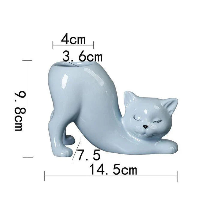 A charming cartoon cat-shaped flower pot made of high-quality glazed porcelain, perfect for adding a playful touch to your home or office decor.