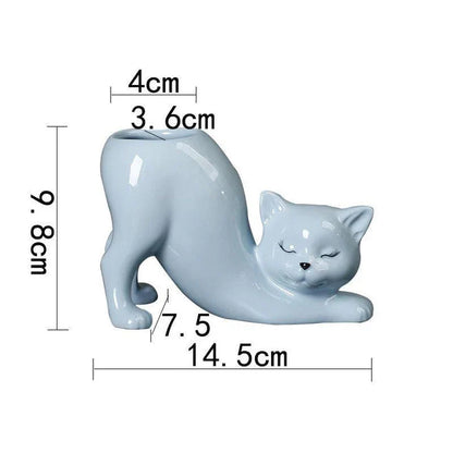 A charming cartoon cat-shaped flower pot made of high-quality glazed porcelain, perfect for adding a playful touch to your home or office decor.
