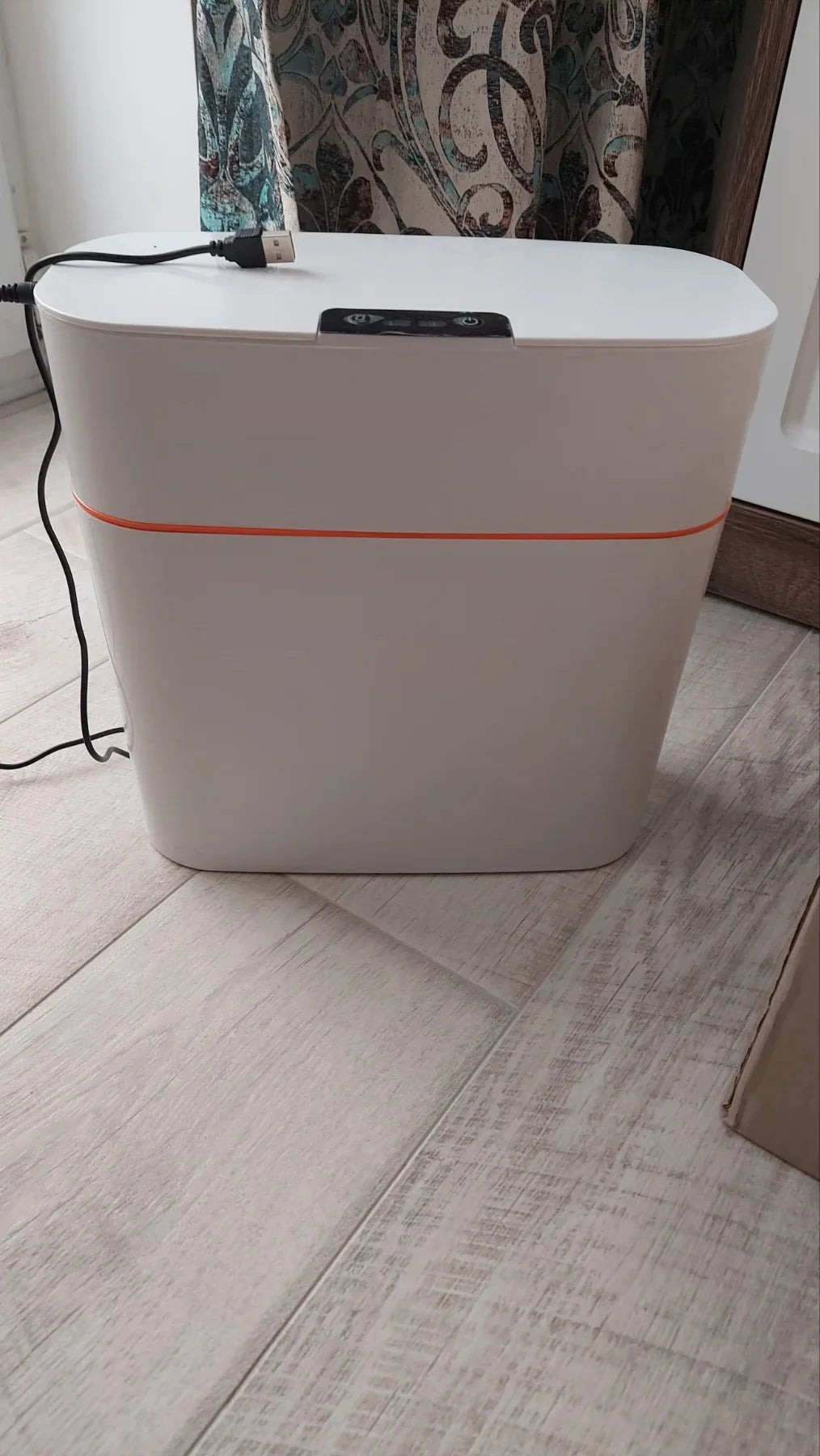 Sleek and modern automatic garbage can with motion-activated sensor for a hygienic and hassle-free waste disposal experience