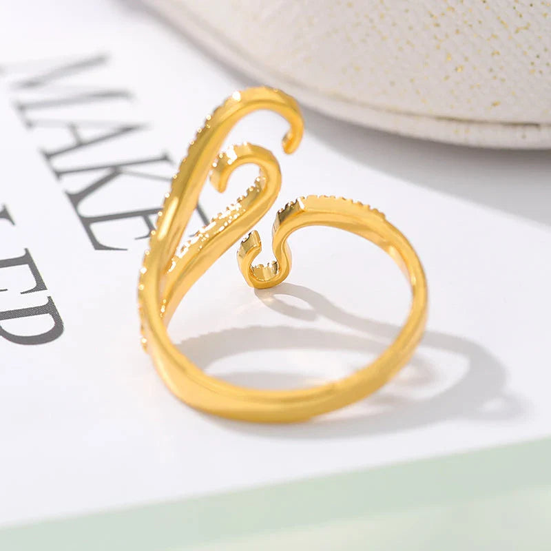 Elegant adjustable wrap ring with a detailed octopus tentacle design, made from durable stainless steel.