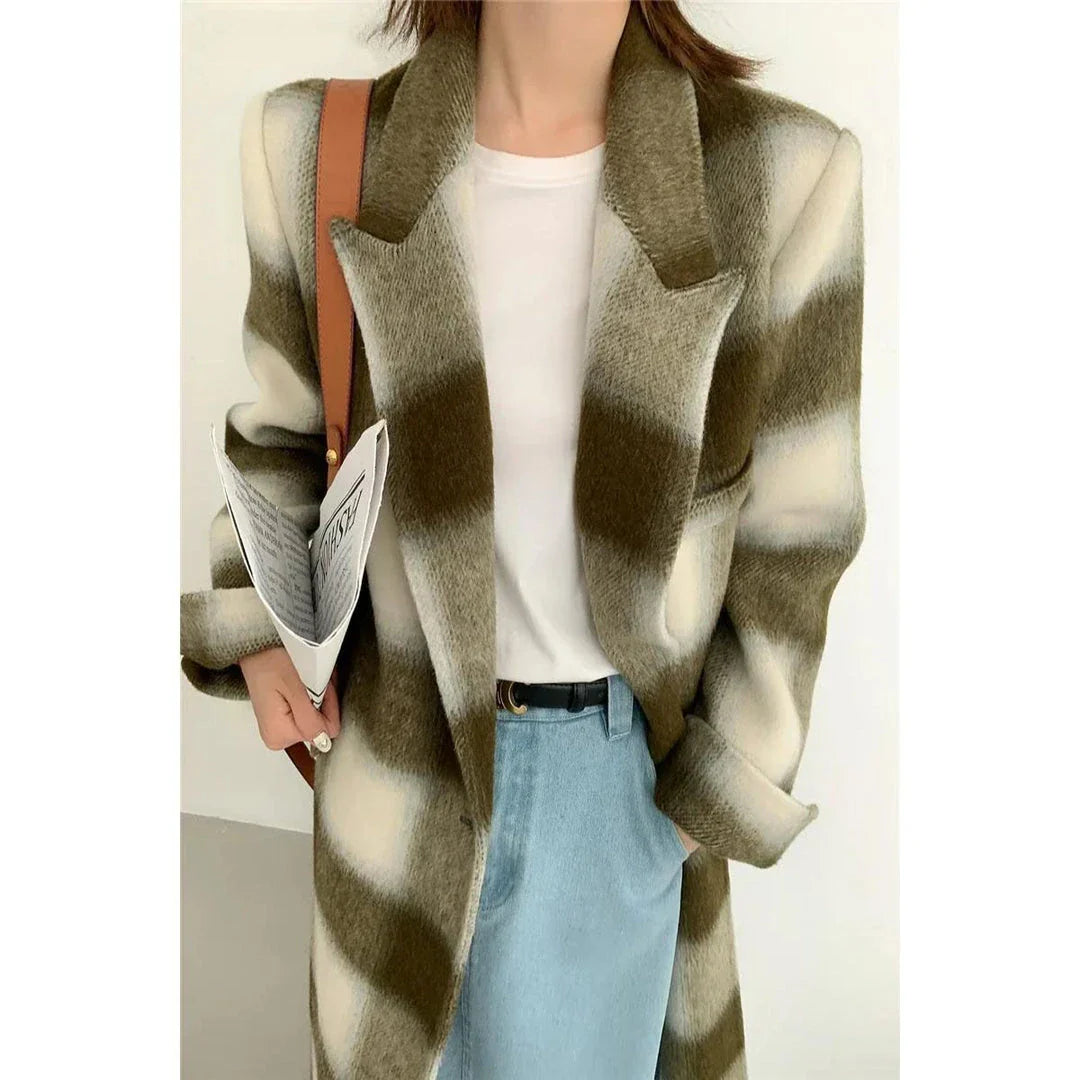 Elegant plaid double-breasted long woollen coat for women, featuring a premium blend of wool, cotton and polyester for exceptional quality and warmth.