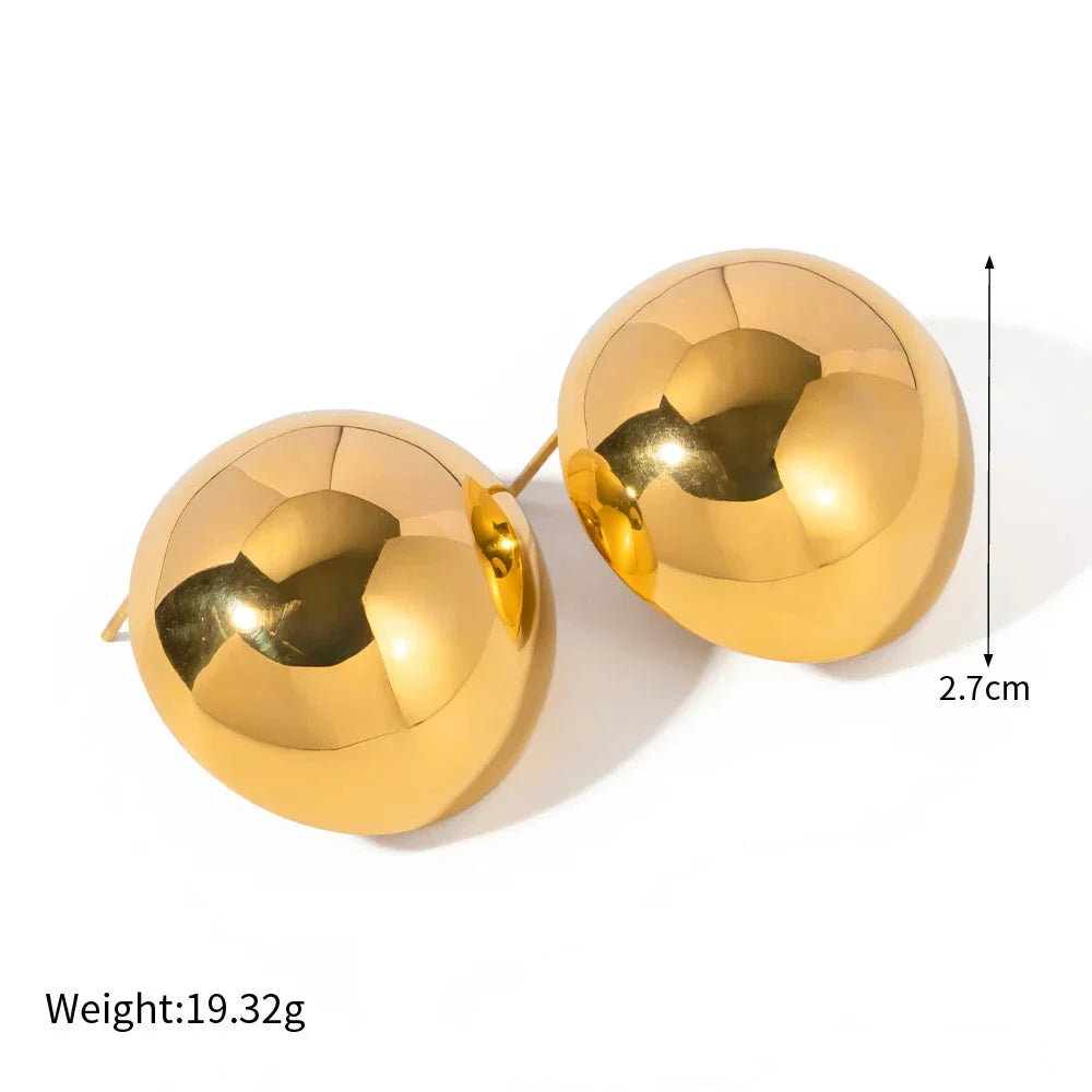 A pair of stylish, 18K gold-plated hemispherical cutout earrings with a sleek, sophisticated design