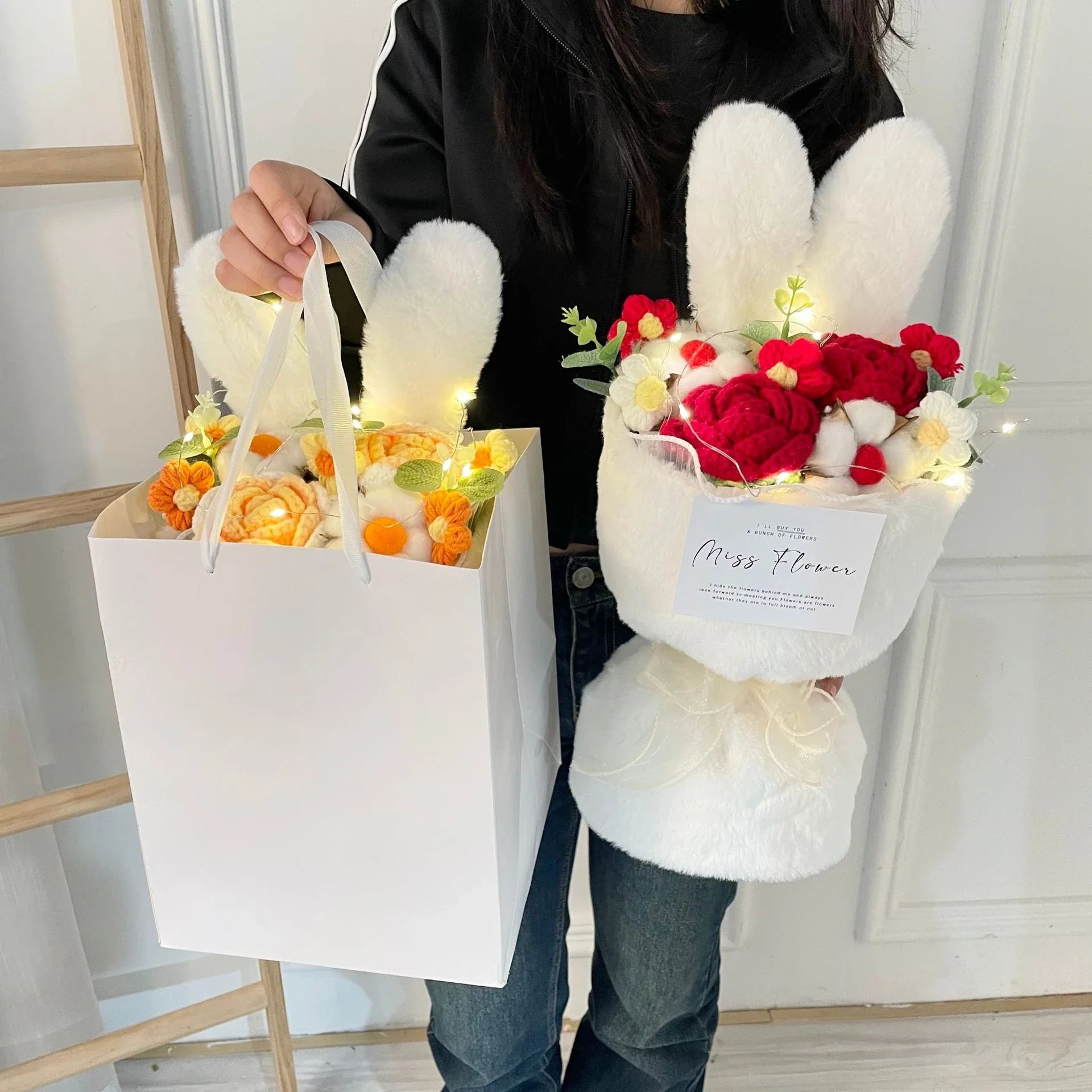 A delightful knitted rabbit bouquet doll in vibrant colours, featuring soft plush materials and a charming design