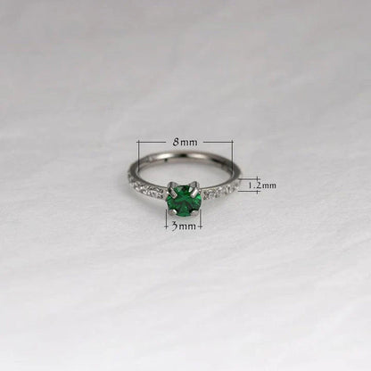 Elegant 8mm zircon stud earrings in white, green, and gold colours, showcasing premium quality and a timeless design