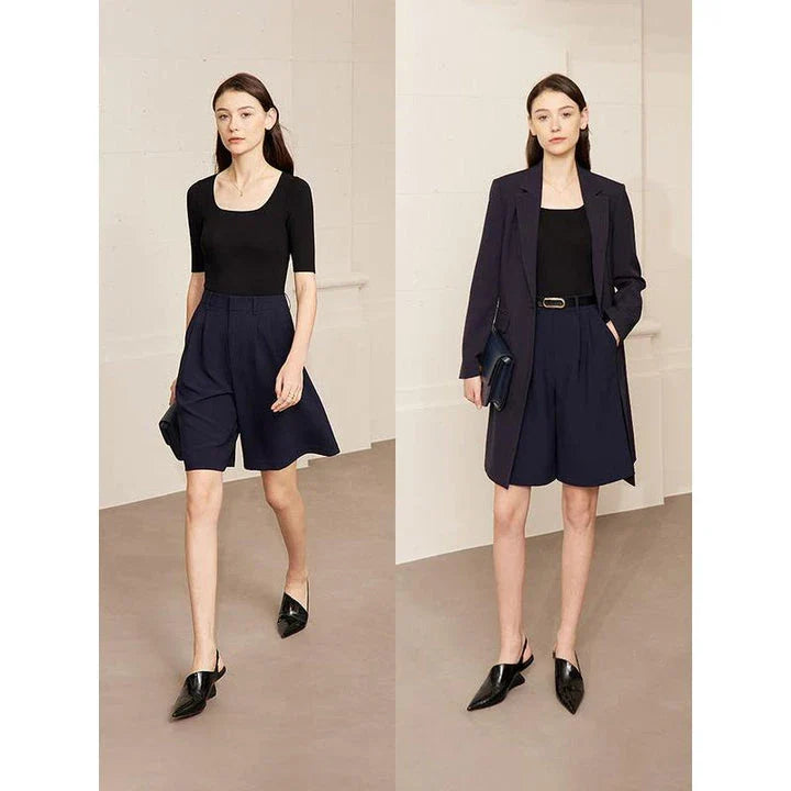 Elegant wide-leg shirred shorts in deep blue, designed for the modern British woman