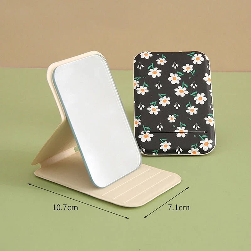 Elegant floral folding makeup mirror with a unique design and clear, distortion-free reflection