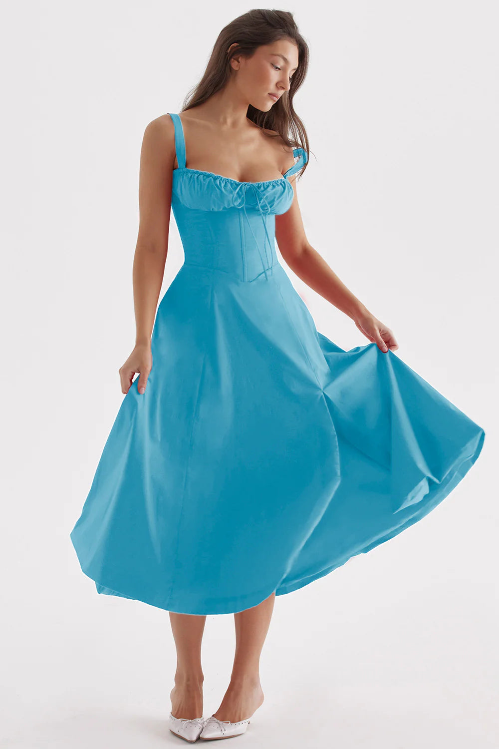 A stylish suspender dress made of premium polyester with a French high-split design, available in a range of vibrant solid colours for versatile summer wear.