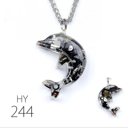 Steampunk-inspired dolphin pendant necklace with electronic components and brass accents