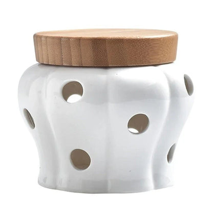 Ceramic and wood garlic storage jar with airtight design and stylish appearance for modern British kitchens