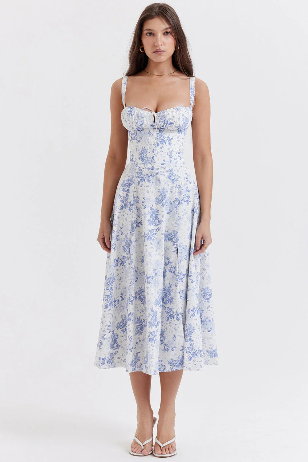 A stylish suspender dress made of premium polyester with a French high-split design, available in a range of vibrant solid colours for versatile summer wear.