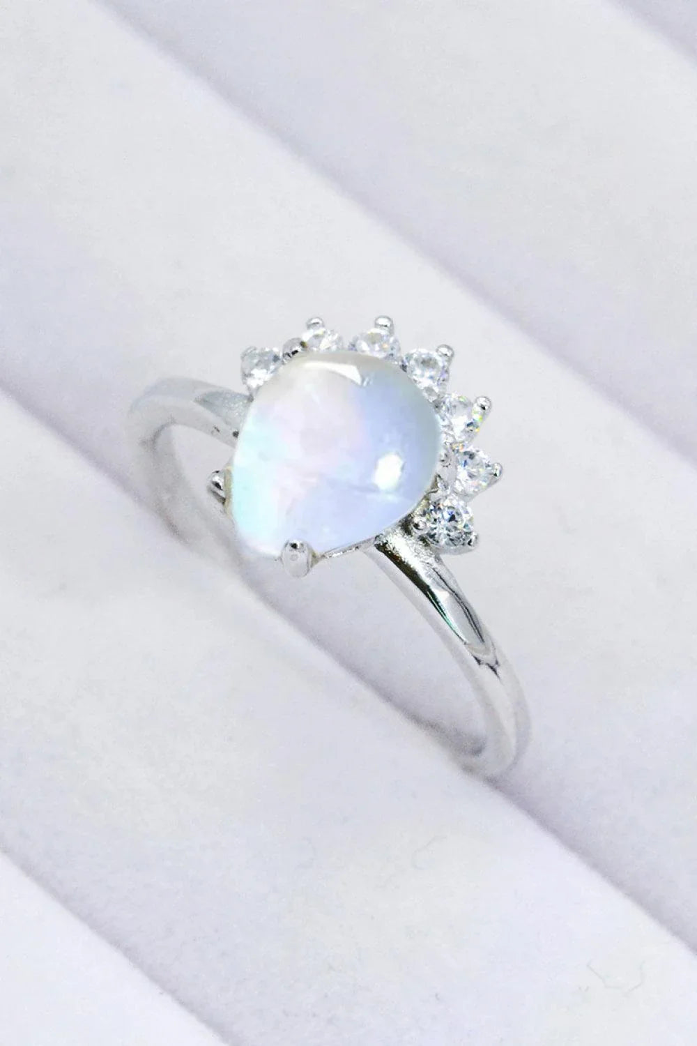 Elegant 925 sterling silver ring featuring a natural moonstone with a captivating blue-violet shimmer