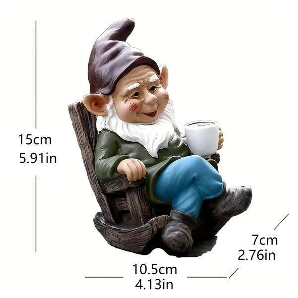 A charming garden gnome ornament made of durable resin, relaxing in a rocking chair and sipping tea, adding a whimsical touch to any outdoor space.