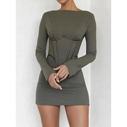 A stylish backless mini dress in a luxurious cotton-polyester blend, perfect for elegant autumn nights out