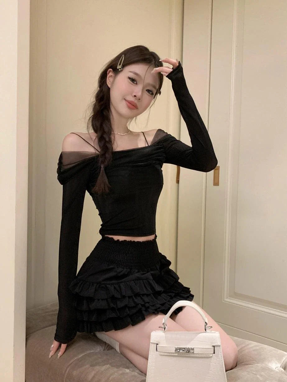 Elegant black off-shoulder blouse made of French-inspired polyester mesh fabric