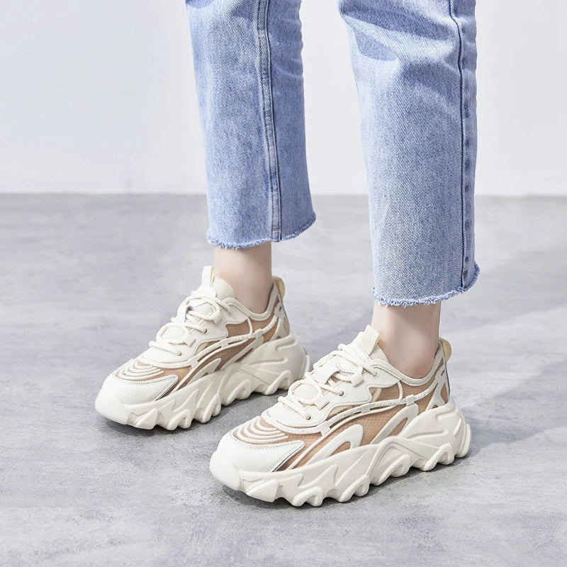Comfortable white platform shoes with thick soles and a trendy 'daddy shoe' design