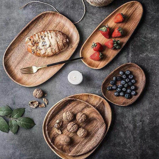 Elegant wooden dining plates with a minimalist, laconic design and natural wood grain