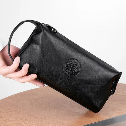 Premium leather clutch bag in a stylish business-casual design with a spacious interior and waterproof construction, perfect for discerning gentlemen on the go.