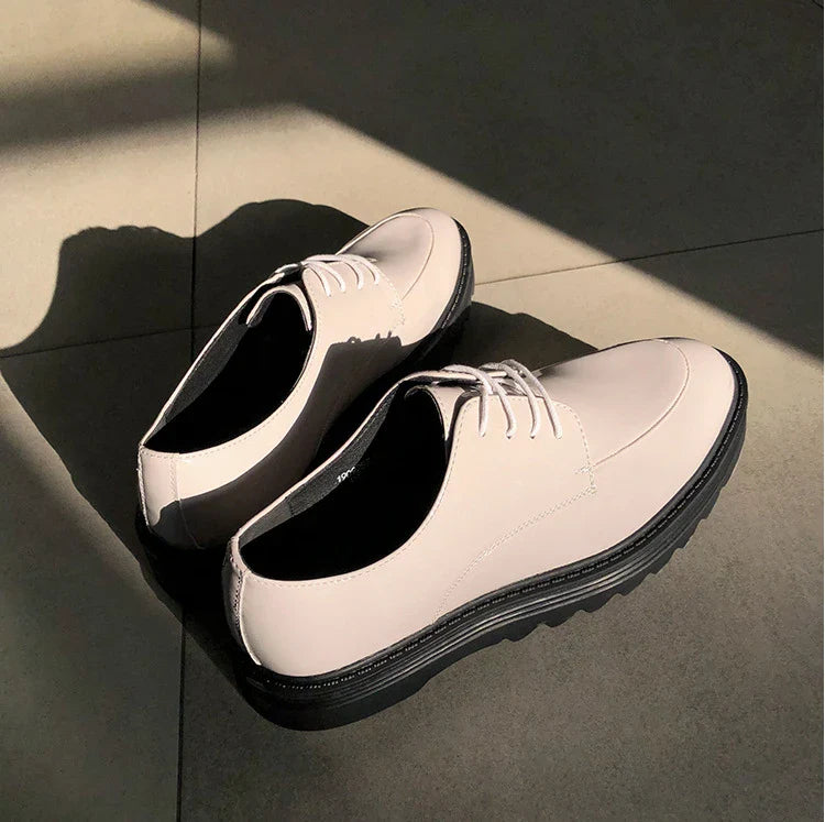 Premium microfiber leather casual shoes with thick rubber sole, low-top design, and striking Korean-inspired details