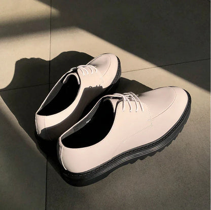 Premium microfiber leather casual shoes with thick rubber sole, low-top design, and striking Korean-inspired details